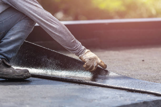 Professional Interior Drainage System technician working in Miramar, FL